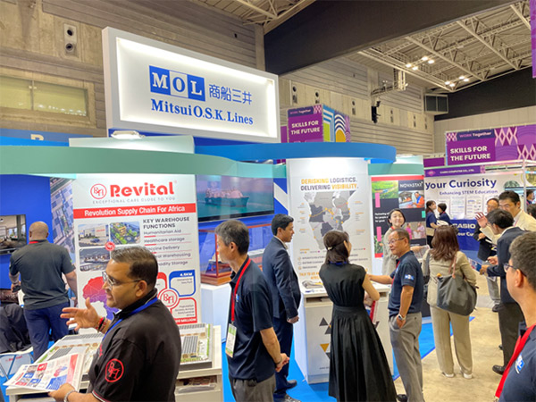 Visitors gather at the MOL booth, where displays feature Revital Healthcare’s logistics collaboration and Africa-focused supply chain projects.